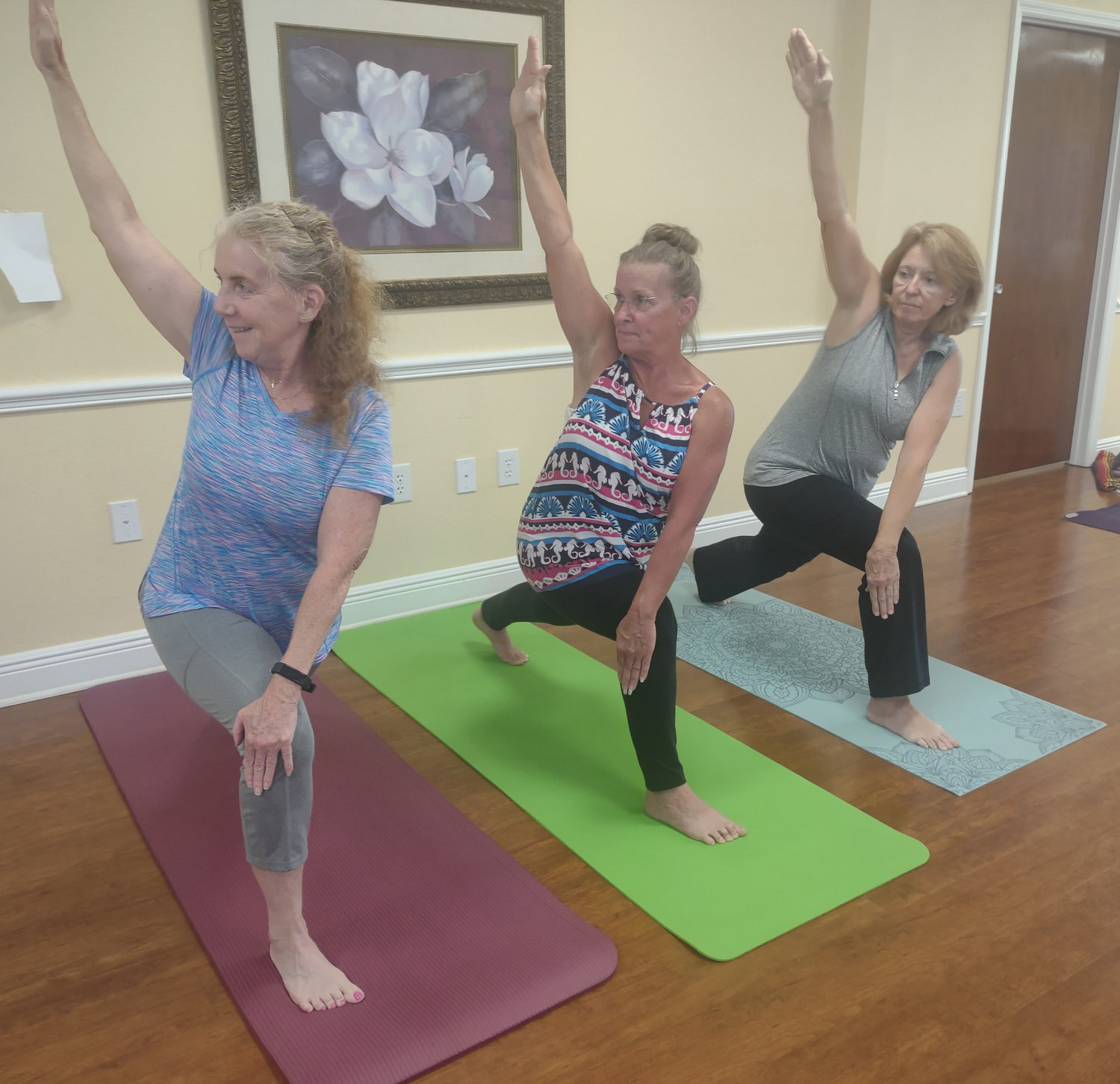 Practicing the windmill lunge are (left to right) Joyce Shafer, Tamara Shafer and Cindy Edgar.